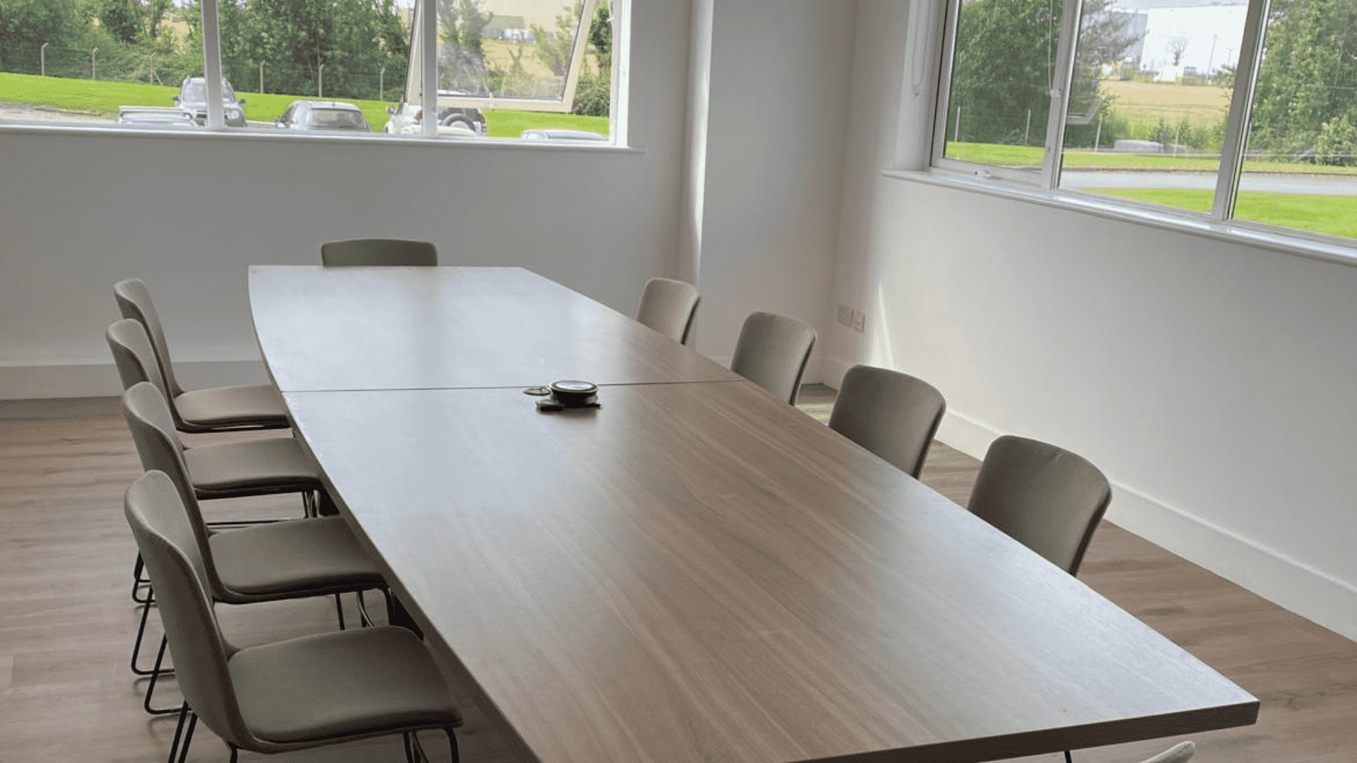 Modern Meeting Room Fit-Out with Hardwood Flooring, Furniture and Lighting